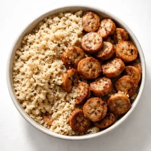 Quinoa chicken sausage bowls with colorful vegetables and fresh herbs, ready in 30 minutes.